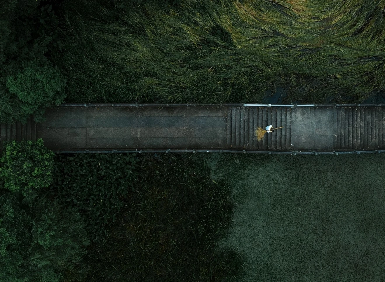 Dark moody aerial landscape with boat